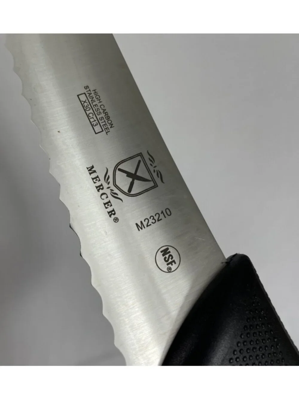 M23210 Millennia Black Handle 10-Inch Wide Wavy Edge Bread Knife